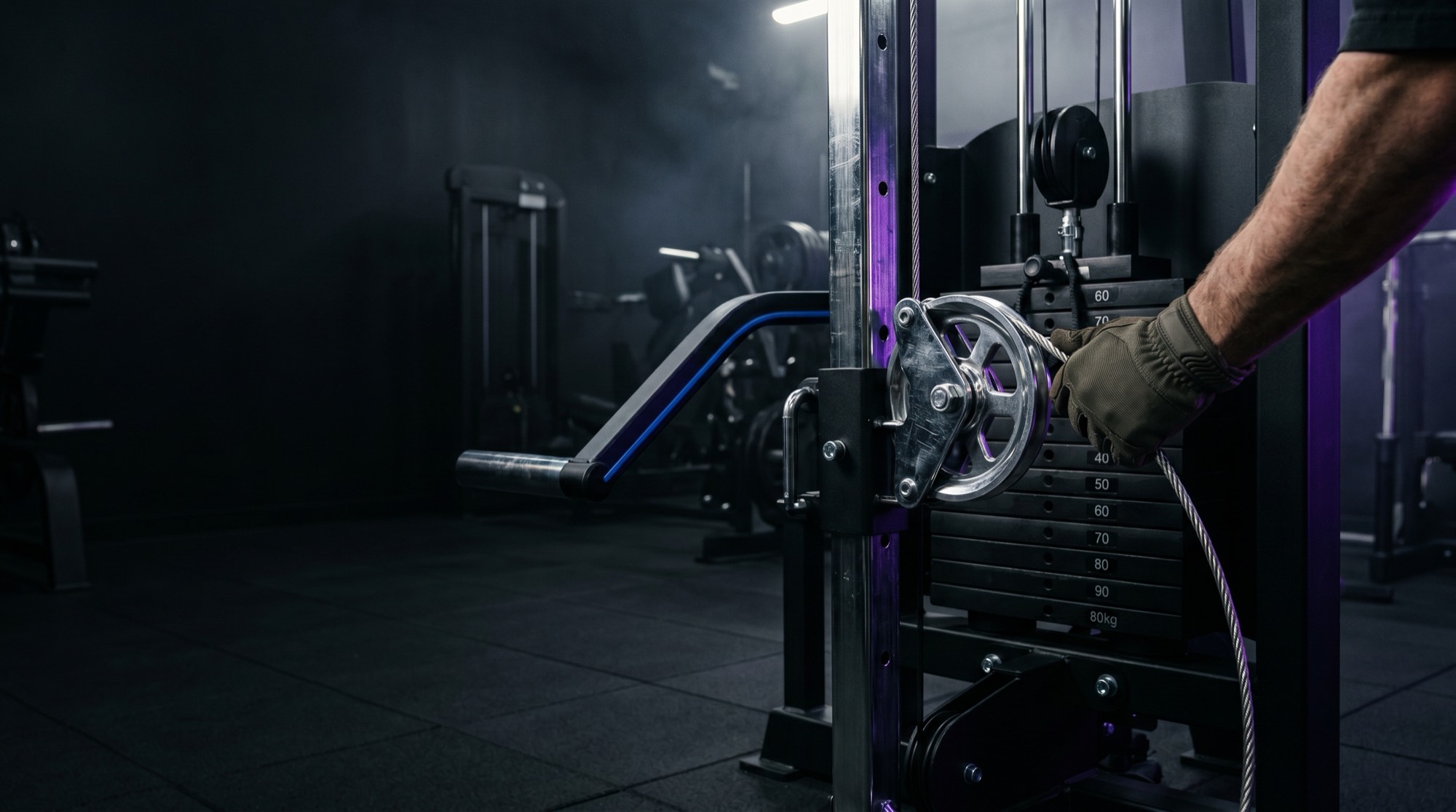 Servicing the cable and pulley stack of a strength machine